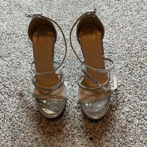 Silver size six Charlotte Russe heels, sparkly!